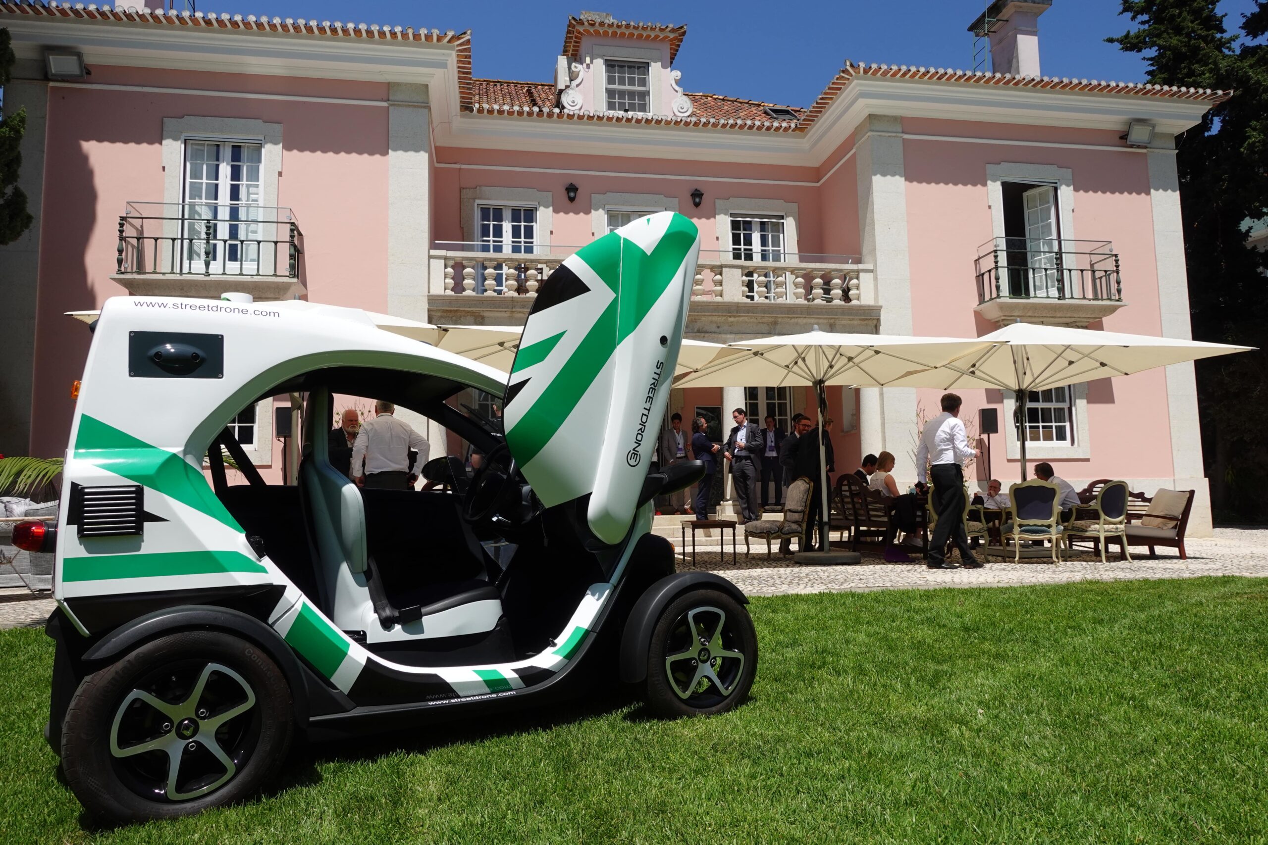 Autonomous StreetDrone Twizy in front of British Ambassador's Residence in Portugal